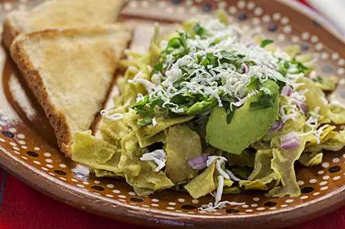 Green Chilaquiles with toasted bread